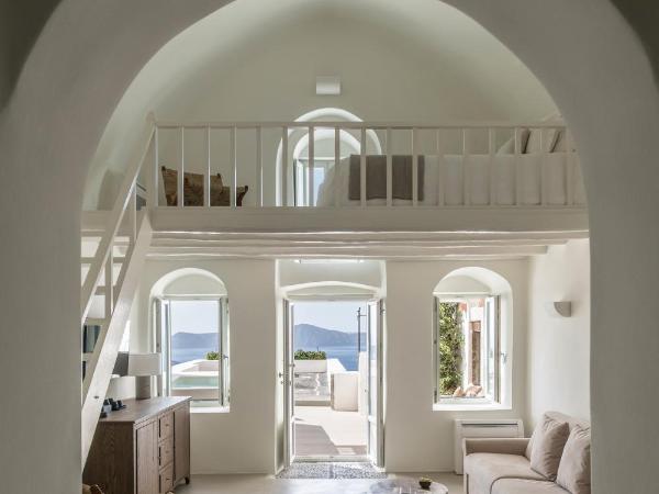 Enigma Suites : photo 7 de la chambre suite signature avec bain à remous