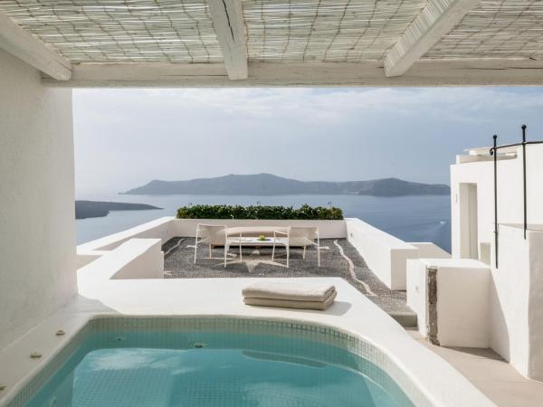 Enigma Suites : photo 1 de la chambre suite signature avec bain à remous