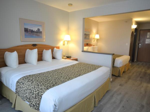 Days Inn & Suites by Wyndham Airport Albuquerque : photo 2 de la chambre chambre lit king-size deluxe - non-fumeurs