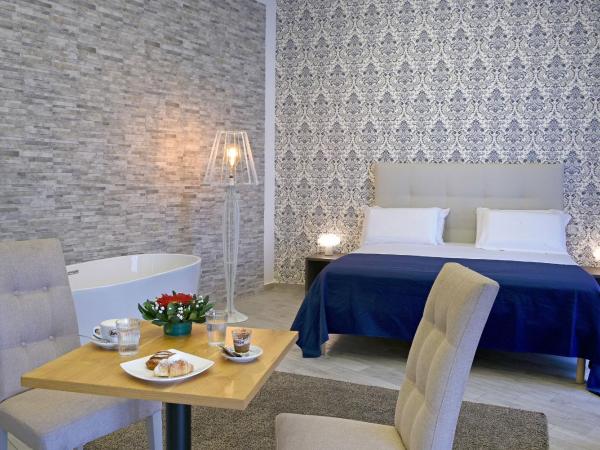 Barbarella HOTEL SPA : photo 5 de la chambre chambre lit queen-size 