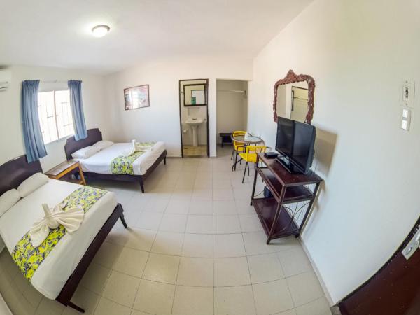 Hotel Isla de Sacrificio : photo 4 de la chambre chambre double standard avec 2 lits doubles