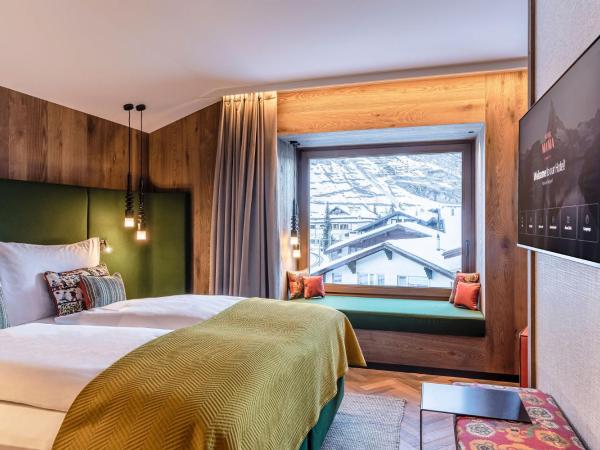 Hotel ZERMAMA Zermatt : photo 4 de la chambre suite deluxe avec jacuzzi - vue sur mont cervin