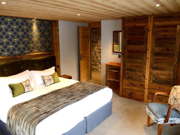 Chalet Cannelle : photo 3 de la chambre chambre double ou lits jumeaux deluxe - vue sur montagne