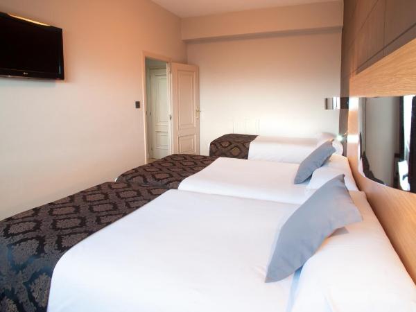 Hotel Universal : photo 2 de la chambre chambre triple