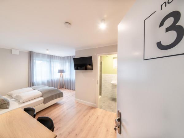 The Woodmans Airport Boardinghouse : photo 2 de la chambre appartement