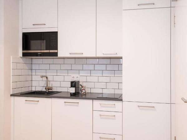 The Woodmans Airport Boardinghouse : photo 8 de la chambre appartement