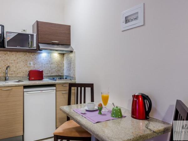 Pilot's Villas Luxury Suites : photo 5 de la chambre suite - vue sur jardin