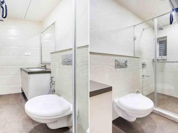 Treebo Premium Tahoora International : photo 5 de la chambre [sanitized] single room