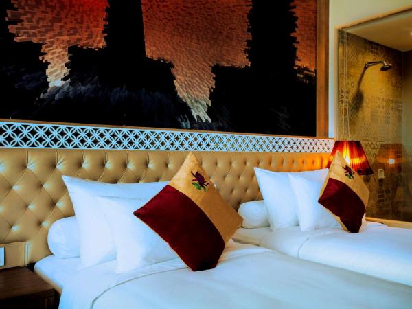 Grand Mercure Yogyakarta Adi Sucipto : photo 9 de la chambre chambre lits jumeaux deluxe