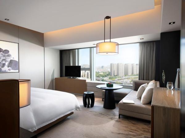 New World Shenyang Hotel : photo 3 de la chambre deluxe river view - double room