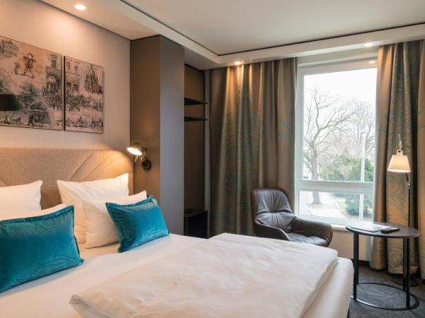 Motel One Dresden - Palaisplatz : photo 4 de la chambre chambre avec lit queen-size 