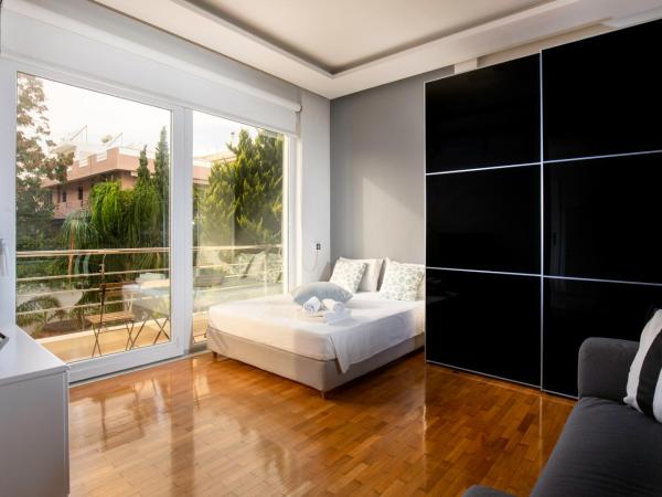 Villa 56 Luxury apartments : photo 1 de la chambre appartement - vue sur piscine 