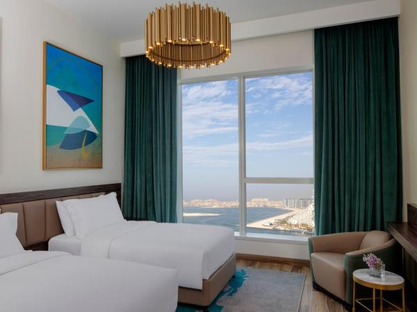 Avani Plus Palm View Dubai Hotel & Suites : photo 3 de la chambre appartement 3 chambres supérieur avec vue sur mer