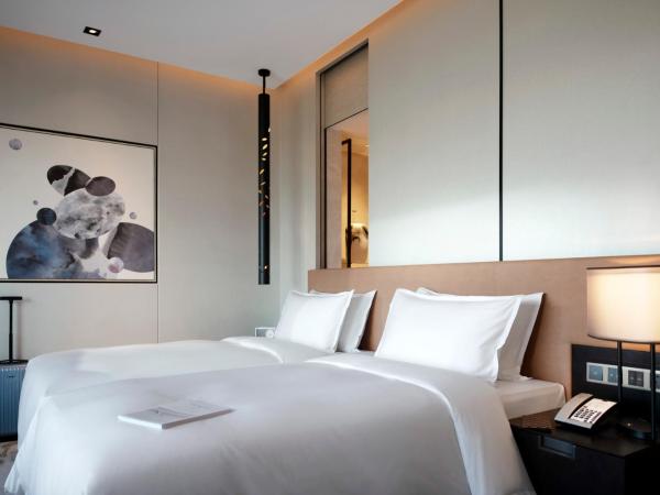 New World Shenyang Hotel : photo 1 de la chambre chambre lits jumeaux deluxe