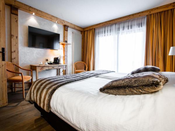 Hôtel Champs Fleuris Morzine : photo 2 de la chambre chambre double ou lits jumeaux supérieure