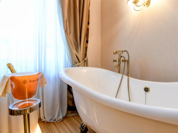 Hotel Master : photo 2 de la chambre chambre double deluxe avec baignoire