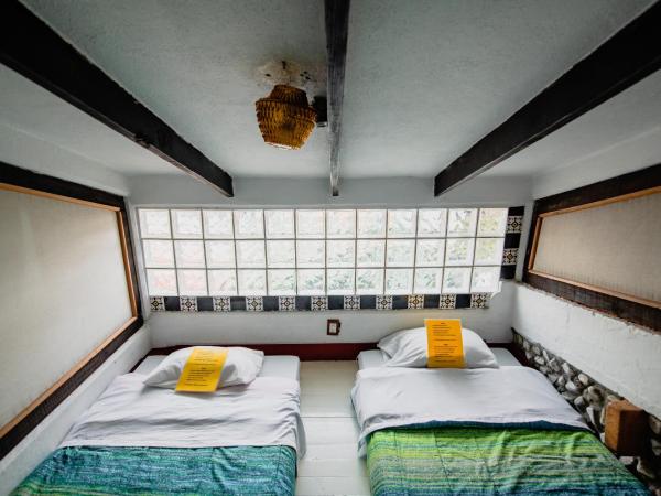 Hostel Mexico DF Airport : photo 5 de la chambre chambre triple basique avec salle de bains commune