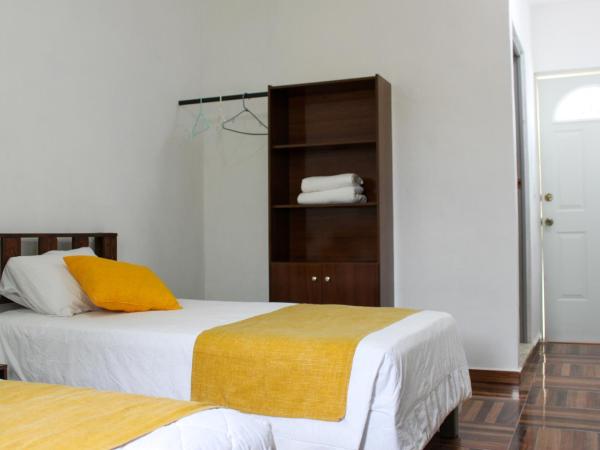 Rooms in Cancun Airport : photo 5 de la chambre chambre double ou lits jumeaux