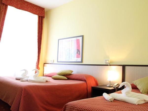 Hotel Lugano : photo 6 de la chambre chambre triple