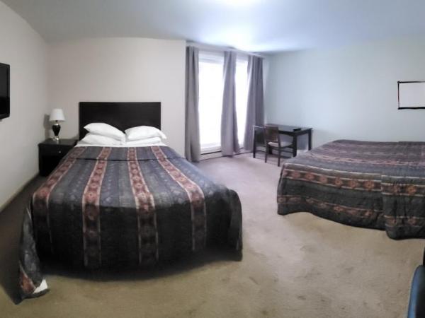 BUDGET LODGE : photo 1 de la chambre chambre double deluxe avec lit d'appoint