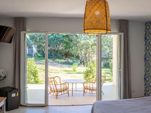 les terrasses d'arutoli : photo 3 de la chambre chambre double - vue sur jardin