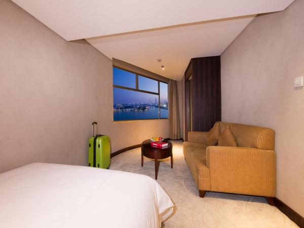 Shu Guang International Hotel : photo 4 de la chambre chambre familiale deluxe