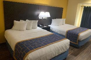 Days Inn & Suites by Wyndham Tampa/Raymond James Stadium : photo 1 de la chambre room #50756316