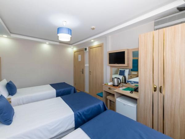 Hotel Yesilpark : photo 4 de la chambre chambre triple