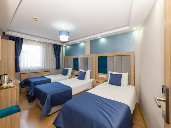 Hotel Yesilpark : photo 1 de la chambre chambre triple