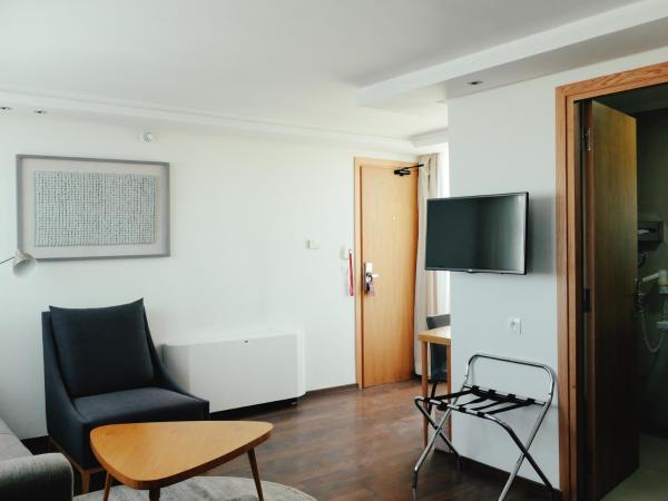 Le Pietri Urban Hotel : photo 5 de la chambre suite lit king-size avec balcon
