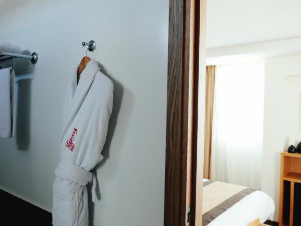 Le Pietri Urban Hotel : photo 2 de la chambre suite lit king-size avec balcon
