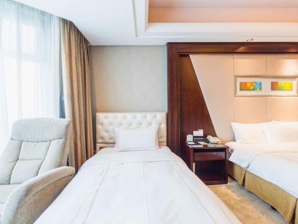 Shu Guang International Hotel : photo 4 de la chambre chambre lits jumeaux exécutive