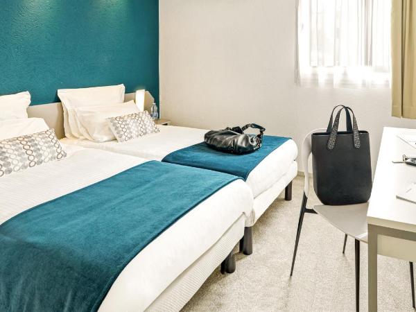 L'Initial : photo 2 de la chambre chambre lits jumeaux