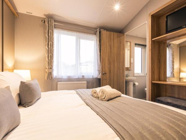 The Haven Lodge with Hot Tub : photo 9 de la chambre pavillon 3 chambres