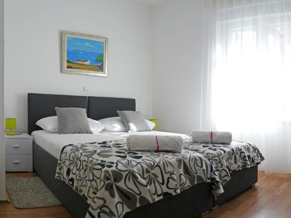 A&M Apartment and Rooms : photo 1 de la chambre chambre lits jumeaux