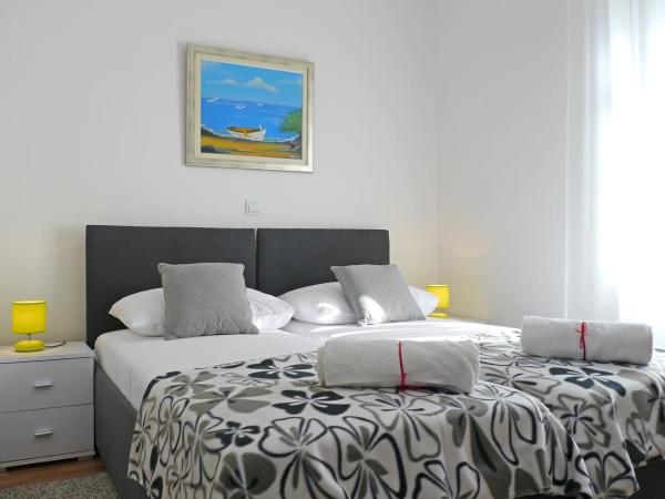 A&M Apartment and Rooms : photo 3 de la chambre chambre lits jumeaux