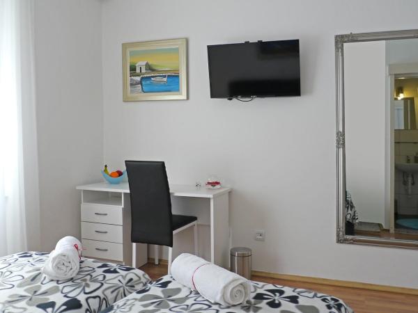 A&M Apartment and Rooms : photo 2 de la chambre chambre lits jumeaux