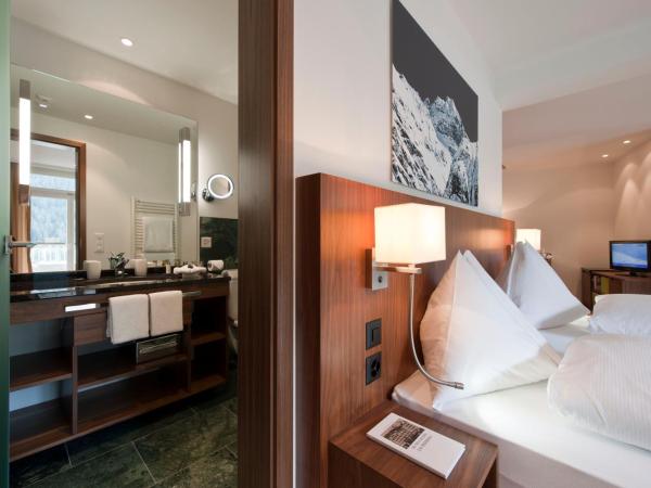 Waldhotel & SPA Davos - for body & soul : photo 6 de la chambre suite junior avec sauna privé