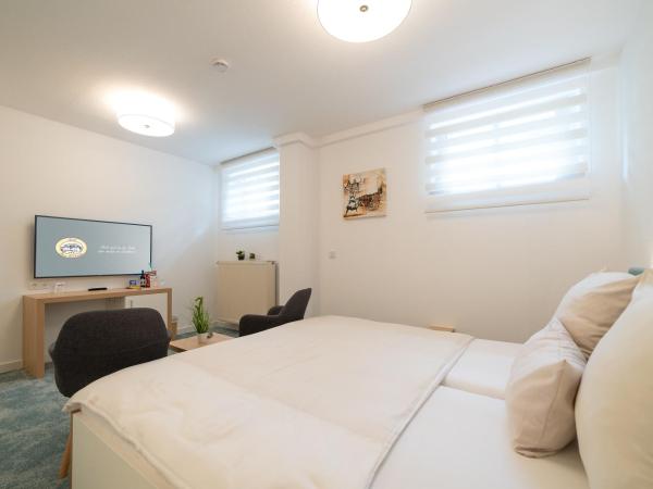 Hotel zum Kuhhirten : photo 2 de la chambre doppelzimmer economy im souterrain