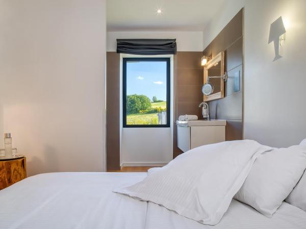 Le Domaine de Baulieu : photo 1 de la chambre chambre double ou lits jumeaux standard