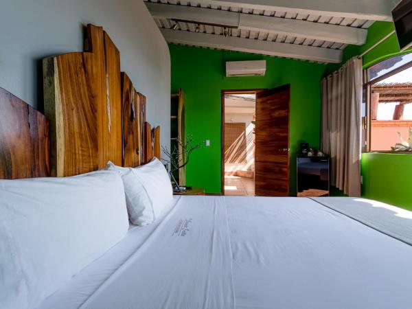 Suites La Hacienda : photo 3 de la chambre chambre lit king-size - vue sur mer