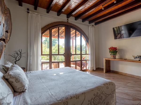 Suites La Hacienda : photo 1 de la chambre suite junior avec terrasse