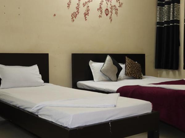 The Salvation Army RED SHIELD GUEST HOUSE : photo 1 de la chambre chambre triple deluxe