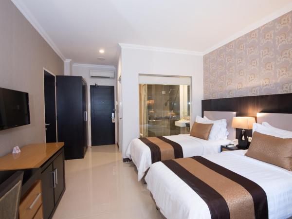The Victoria Hotel Yogyakarta : photo 2 de la chambre chambre double ou lits jumeaux deluxe - vue sur ville 