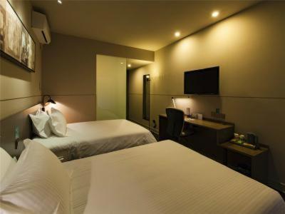 Jinjiang Inn Select Wuxi Nanchang Street Huaqing Bridge Metro Station : photo 2 de la chambre chambre lits jumeaux b