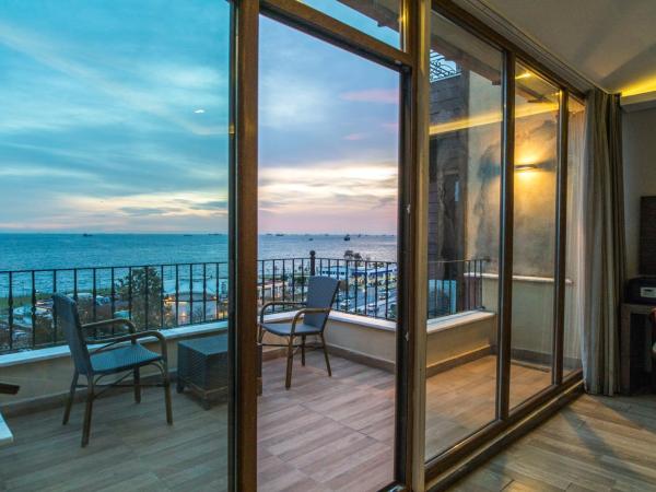 Cheers Lighthouse : photo 6 de la chambre chambre triple supérieure - vue sur mer