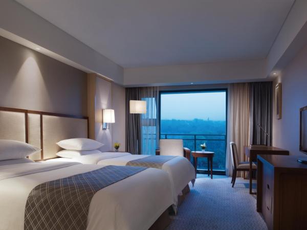 Jinling Riverside Hotel : photo 3 de la chambre chambre lits jumeaux deluxe