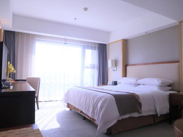 Jinling Riverside Hotel : photo 2 de la chambre suite supérieure 