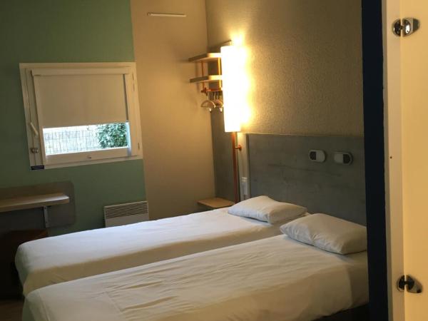 ibis budget Rochefort : photo 1 de la chambre chambre lits jumeaux