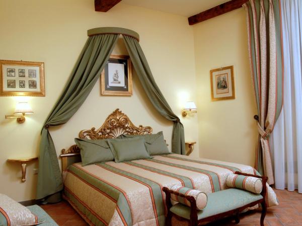 La Casa Del Garbo - Luxury Rooms & Suite : photo 1 de la chambre chambre deluxe